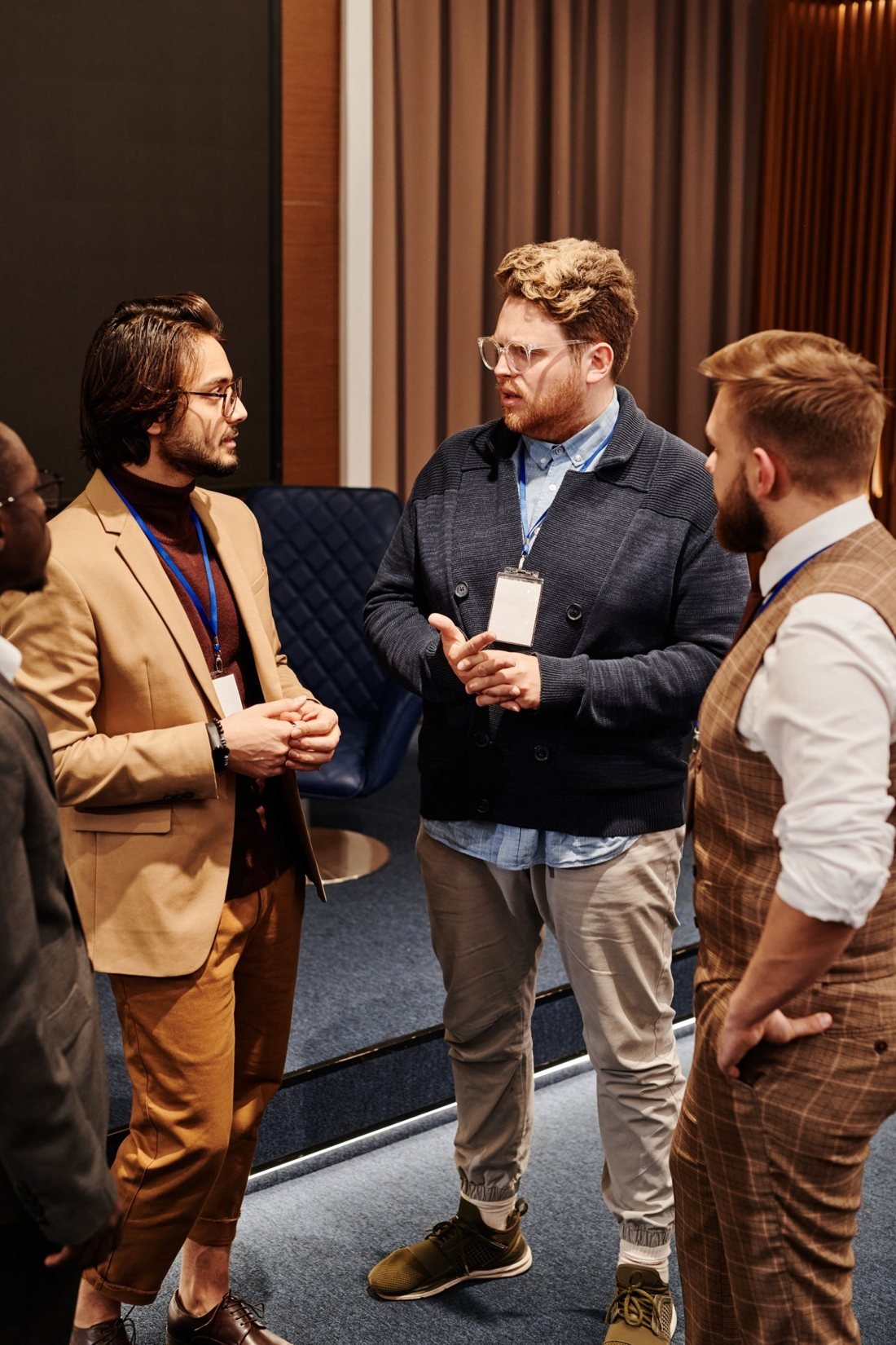 Entrepreneurs in conversation at a 118Society gathering